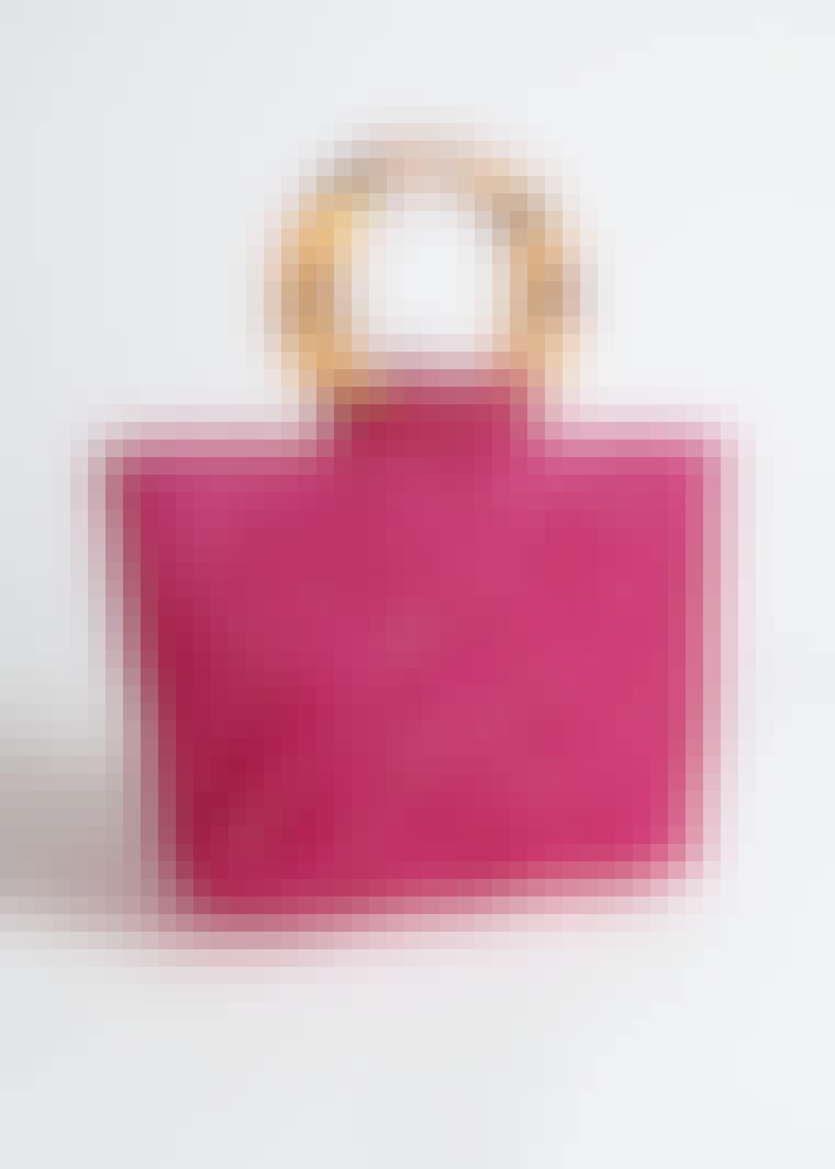Pink perlebesat taske i firkantet silhouet