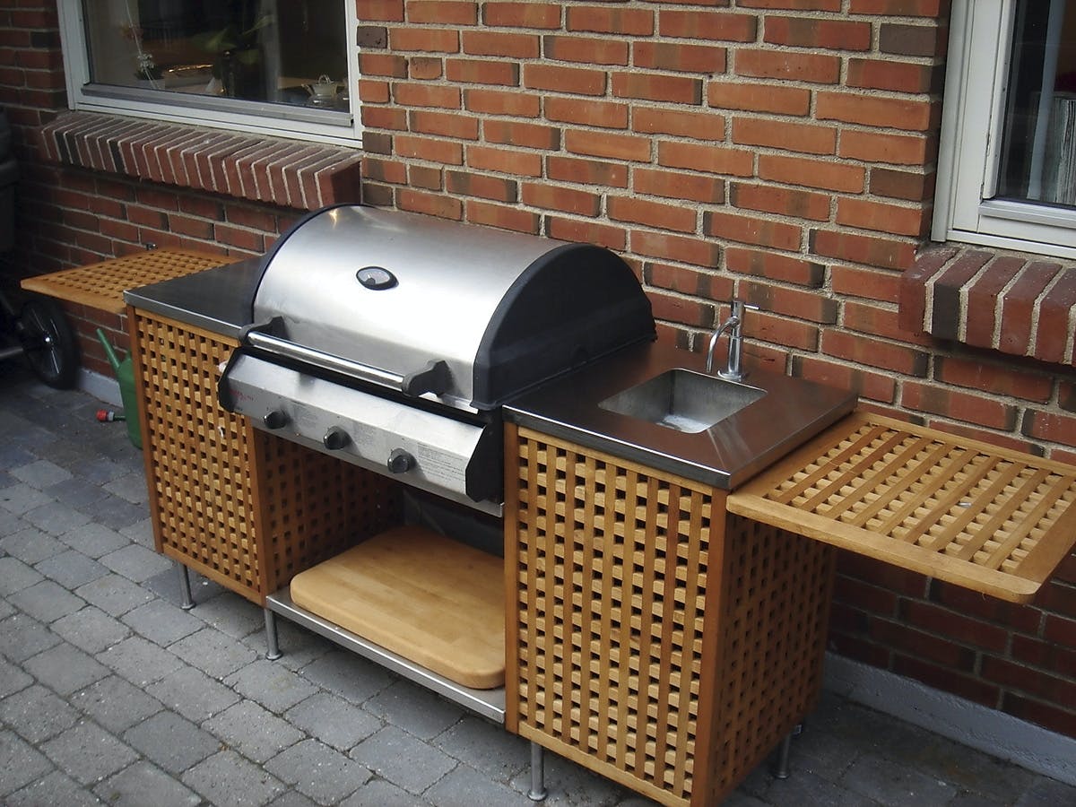 Utekjøkken grill av skittentøyskurver