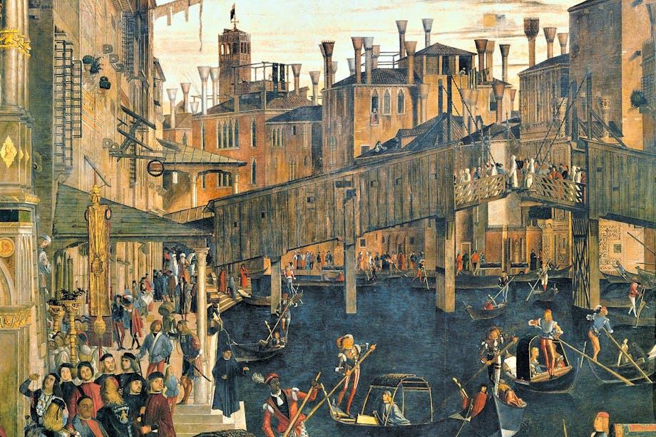 Vy över Venedig från medeltiden med gondoler på kanalerna och broar av trä. Vy över Venedig från medeltiden med gondoler på kanalerna och broar av trä.