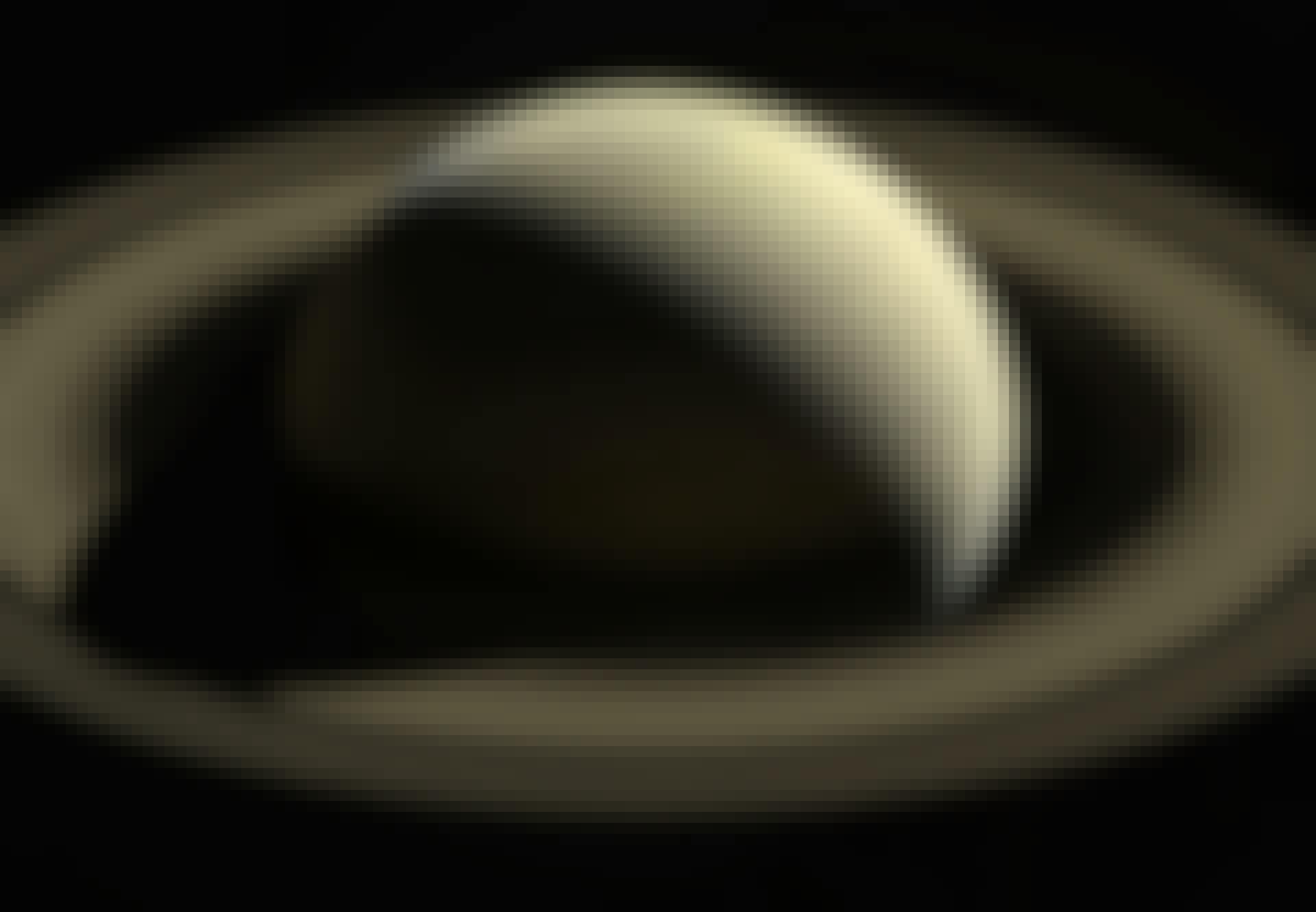 Saturnus nordpol ändrar färg från blått till guld Saturnus nordpol ändrar färg från blått till guld