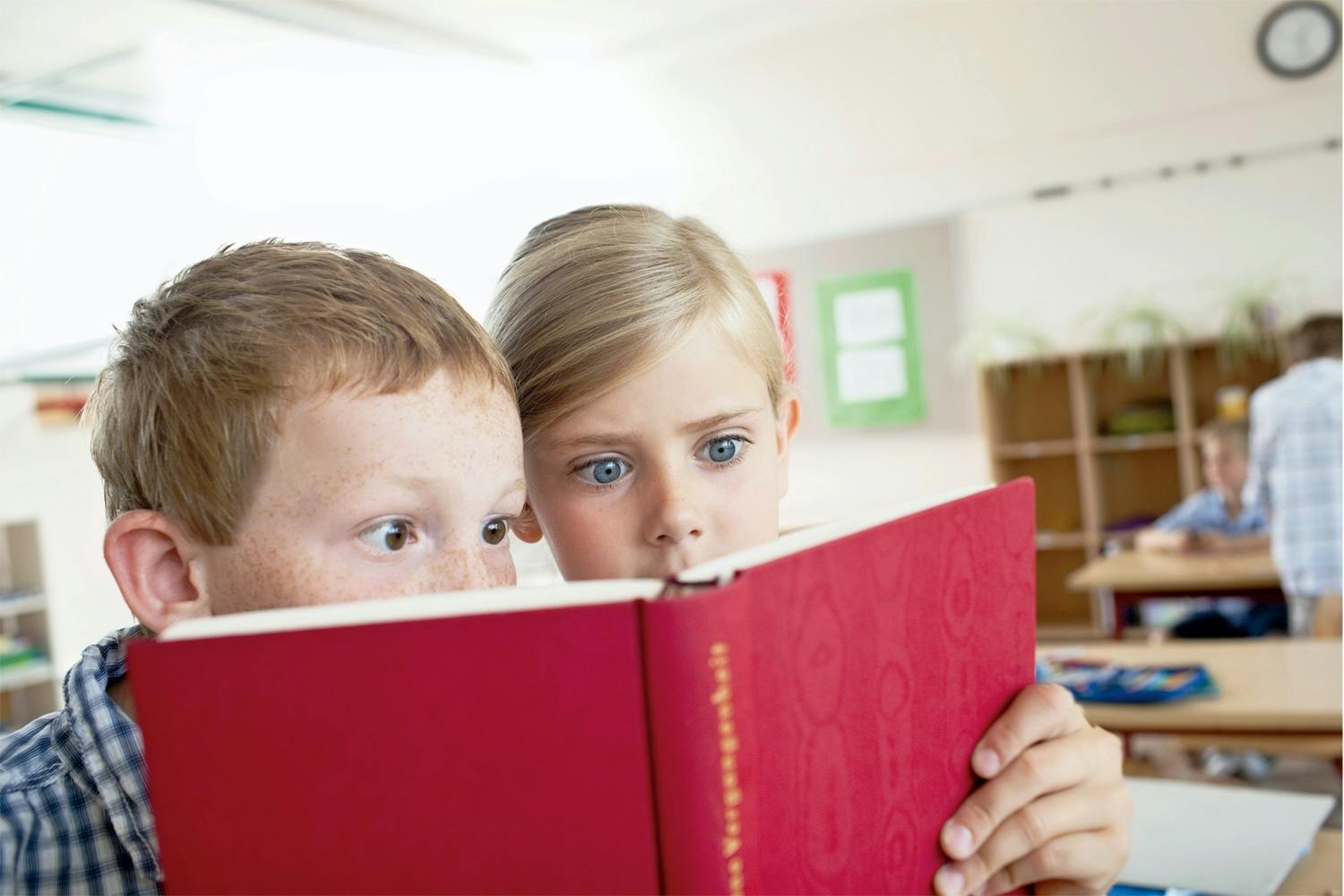 Boy and girl reading Boy and girl reading