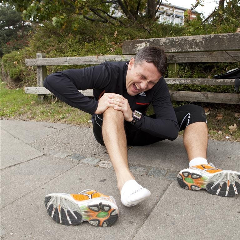 Cramp spasm hurt knee man runner Cramp spasm hurt knee man runner
